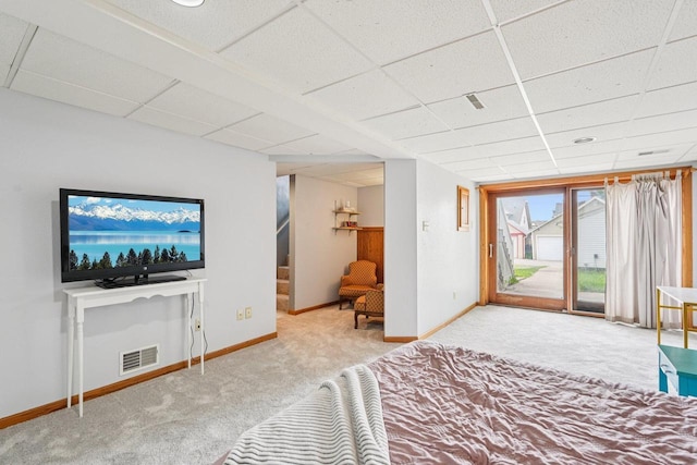509 S 6th Ave, West Bend, WI 53095 - bedroom featuring a drop ceiling, carpet floors, and access to exterior