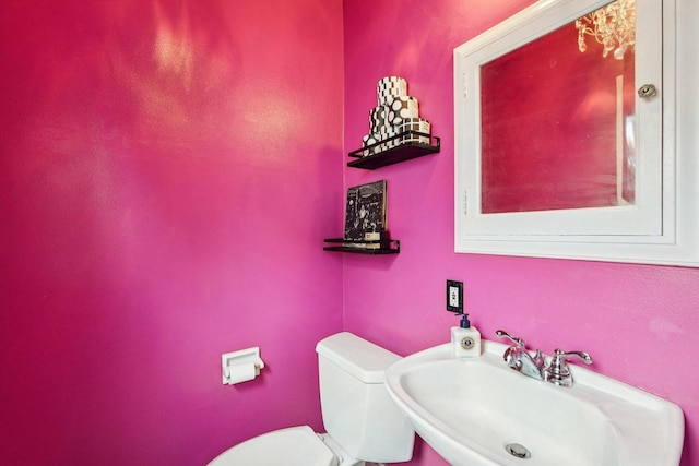 509 S 6th Ave, West Bend, WI 53095 - half bathroom with a sink and toilet