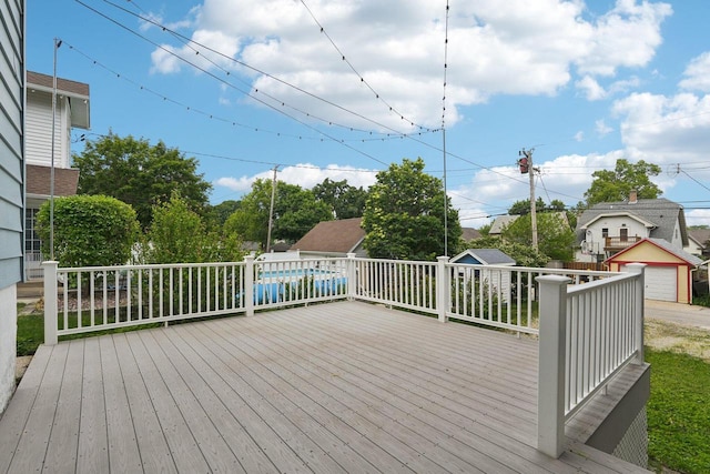 509 S 6th Ave, West Bend, WI 53095 - wooden deck featuring an outdoor structure