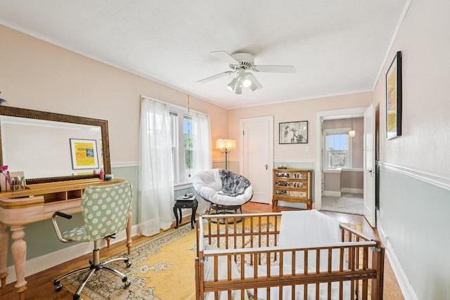 509 S 6th Ave, West Bend, WI 53095 - bedroom with multiple windows and wood finished floors