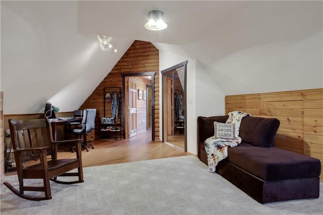 5683N Ham-Holly Dr, Stone Lake, WI 54876 - sitting room featuring wood walls, lofted ceiling, a desk, and carpet flooring