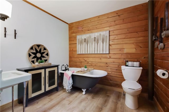 5683N Ham-Holly Dr, Stone Lake, WI 54876 - full bath with a freestanding tub, wooden walls, and wood finished floors