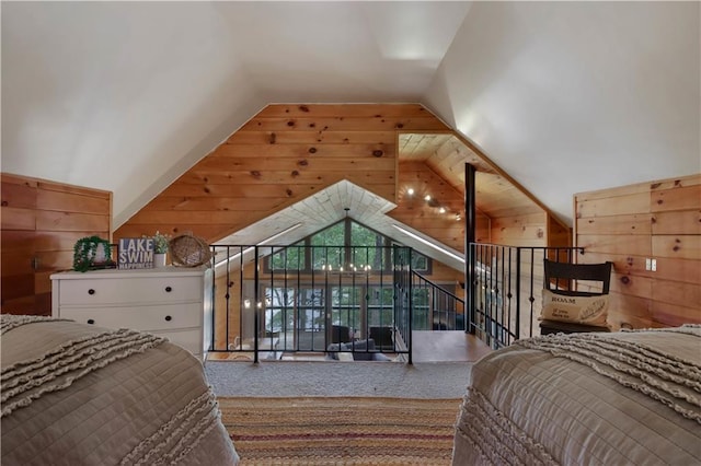5683N Ham-Holly Dr, Stone Lake, WI 54876 - bedroom with wood walls and vaulted ceiling