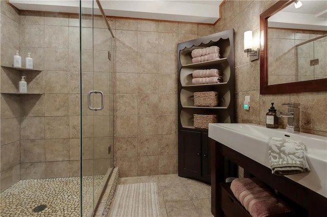 5683N Ham-Holly Dr, Stone Lake, WI 54876 - bathroom featuring tile walls, a stall shower, vanity, and tile patterned floors