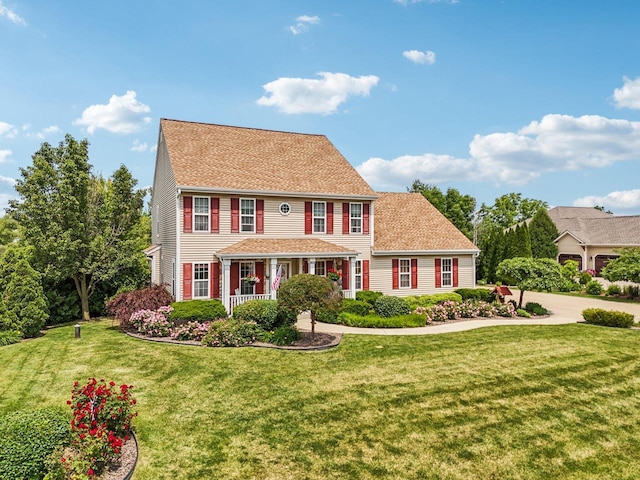 8216 Anna Ave, Wind Lake, WI 53185 - colonial home with a front yard