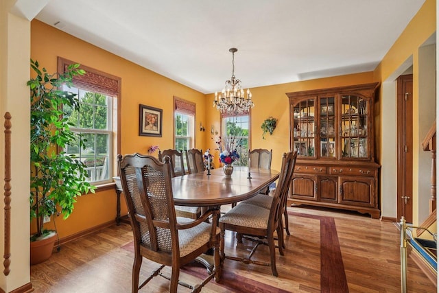 8216 Anna Ave, Wind Lake, WI 53185 - dining room with light wood-type flooring and a chandelier