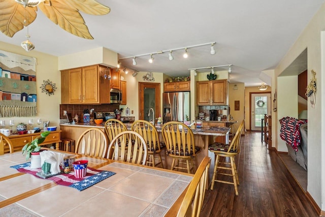 8216 Anna Ave, Wind Lake, WI 53185 - dining area featuring dark wood-type flooring