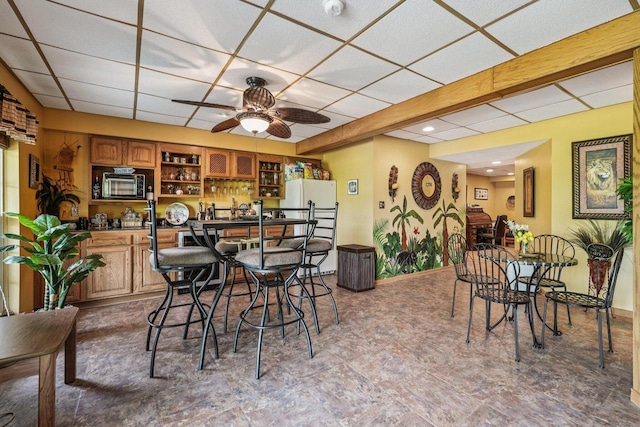 8216 Anna Ave, Wind Lake, WI 53185 - dining room featuring a paneled ceiling and a ceiling fan