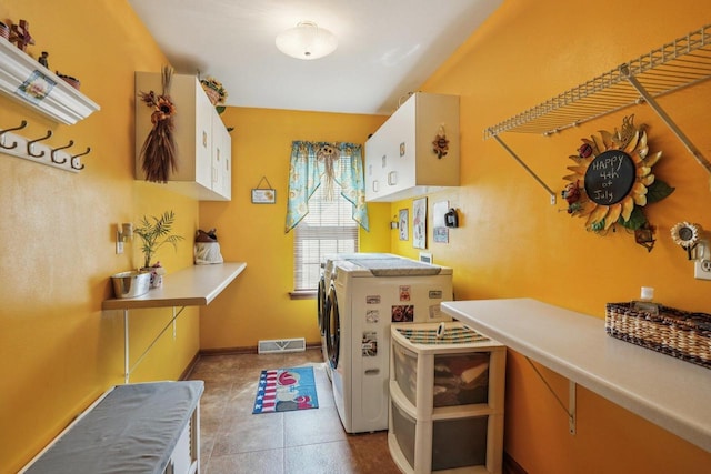 8216 Anna Ave, Wind Lake, WI 53185 - washroom with cabinet space, washing machine and dryer, and tile patterned floors