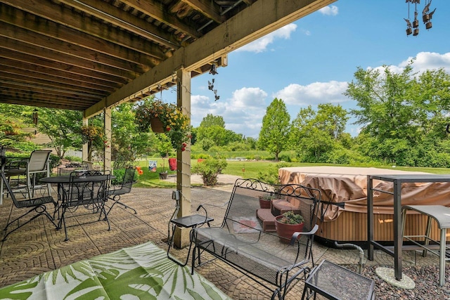 8216 Anna Ave, Wind Lake, WI 53185 - view of patio / terrace with a hot tub and outdoor dining area