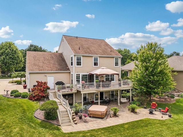 8216 Anna Ave, Wind Lake, WI 53185 - back of house featuring a hot tub, an outdoor fire pit, a patio, a deck, and stairs