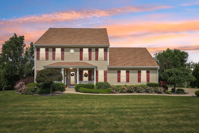8216 Anna Ave, Wind Lake, WI 53185 - view of front of home with a lawn, covered porch, and roof with shingles
