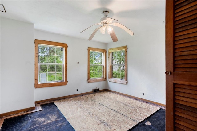 1507 N Peach Ave, Marshfield, WI 54449 - spare room with a ceiling fan and baseboards