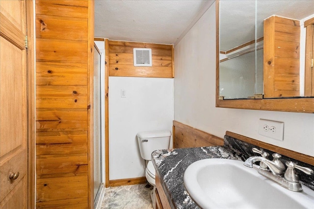 1507 N Peach Ave, Marshfield, WI 54449 - bathroom with a shower stall, vanity, and a textured ceiling
