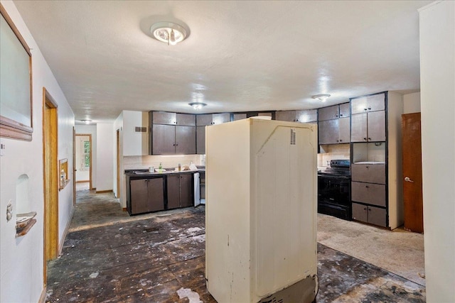 1507 N Peach Ave, Marshfield, WI 54449 - kitchen with black / electric stove and fridge