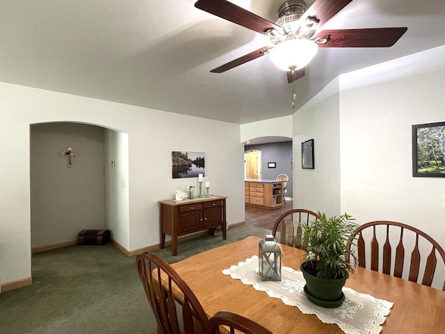 1216 Pond View Cir, De Pere, WI 54115 - dining room with arched walkways, carpet, and a ceiling fan