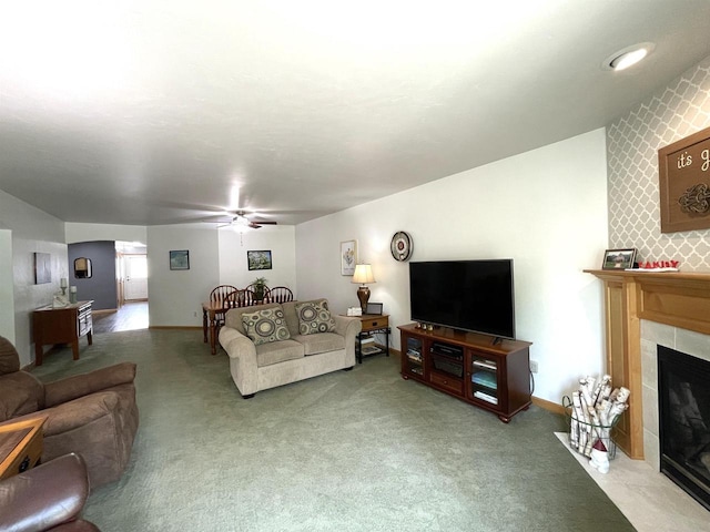 1216 Pond View Cir, De Pere, WI 54115 - living area featuring a fireplace, light carpet, and ceiling fan