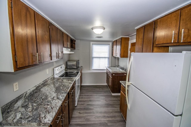 1617 Sauk Trail Rd, Sheboygan, WI 53081 - kitchen featuring white appliances, dark wood-type flooring, under cabinet range hood, and brown cabinetry