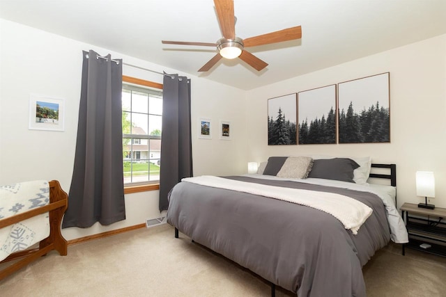 2137 Olde Country Cir, Kaukauna, WI 54130 - bedroom with light carpet and a ceiling fan