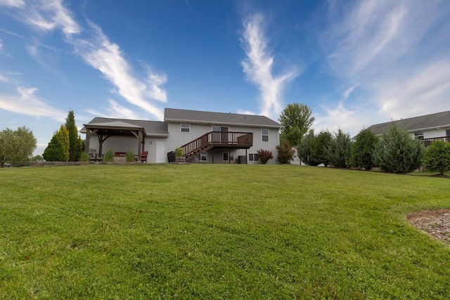 2137 Olde Country Cir, Kaukauna, WI 54130 - back of house with a gazebo, a yard, a wooden deck, and stairway