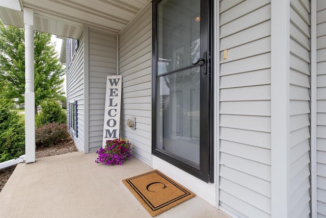 2137 Olde Country Cir, Kaukauna, WI 54130 - entrance to property featuring a porch