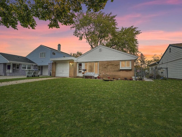5628 W Montana St, Milwaukee, WI 53219 - view of front of house featuring brick siding, a garage, and driveway