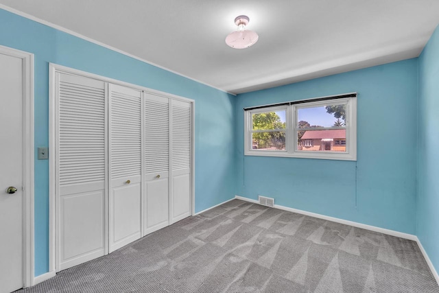 5531 W Stack Dr, Milwaukee, WI 53219 - unfurnished bedroom featuring light carpet and a closet