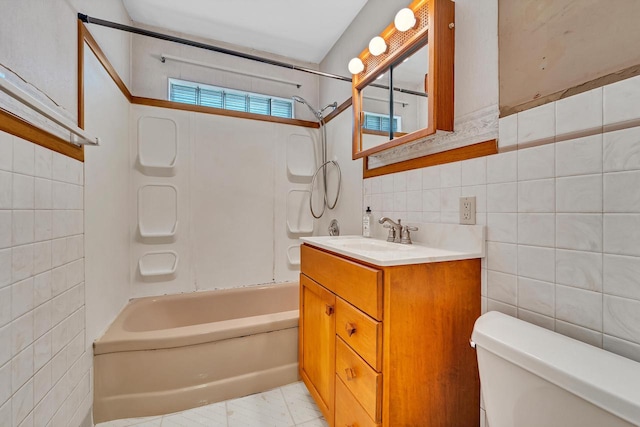 5531 W Stack Dr, Milwaukee, WI 53219 - full bathroom featuring tile walls, vanity, and  shower combination