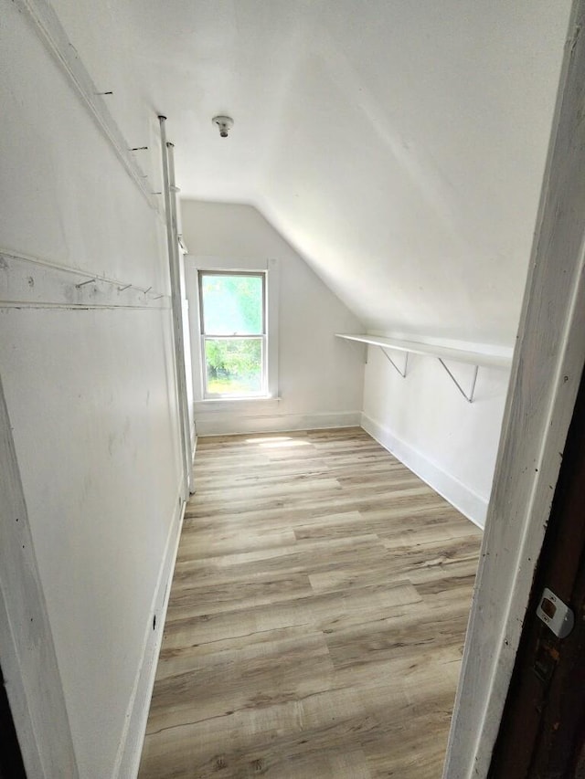 1528 Taylor Ave, Racine, WI 53403 - additional living space with vaulted ceiling and light wood-style flooring