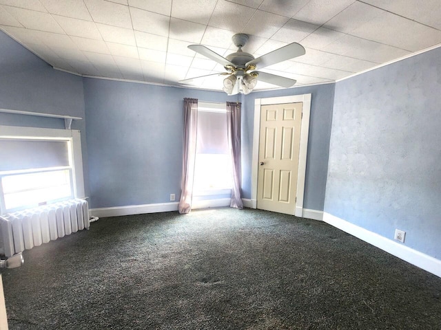 1528 Taylor Ave, Racine, WI 53403 - carpeted empty room with plenty of natural light, radiator heating unit, and a ceiling fan