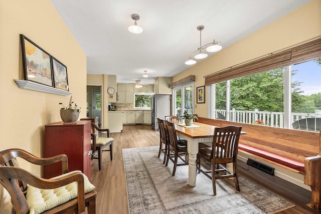 1242 E Edgewood Dr, Appleton, WI 54913 - dining room with light wood-style flooring and ceiling fan