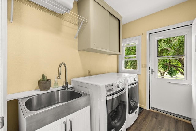 1242 E Edgewood Dr, Appleton, WI 54913 - washroom with cabinet space, washer and dryer, and dark wood finished floors