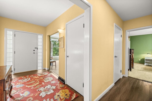 1242 E Edgewood Dr, Appleton, WI 54913 - entryway with dark wood-type flooring and baseboards