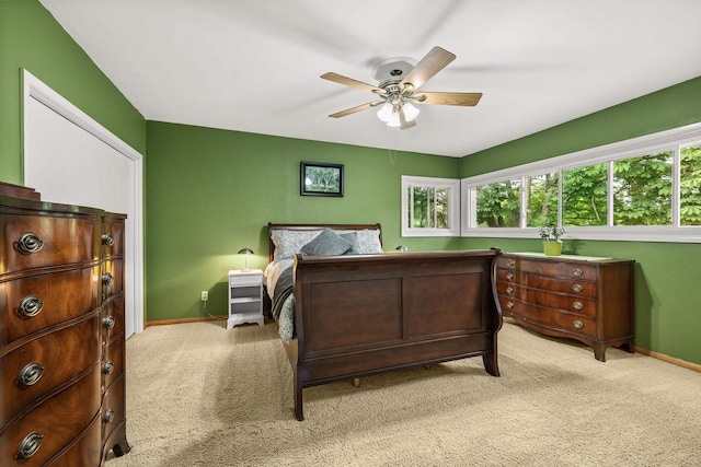 1242 E Edgewood Dr, Appleton, WI 54913 - bedroom featuring light carpet, multiple windows, and a ceiling fan