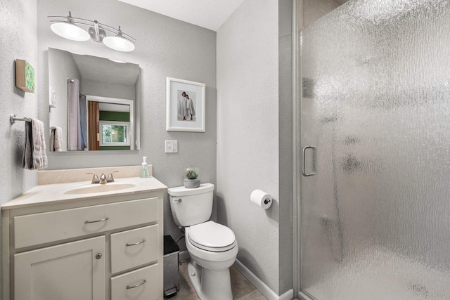 1242 E Edgewood Dr, Appleton, WI 54913 - bathroom with a stall shower, vanity, and a textured wall