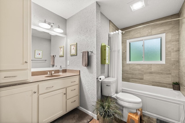 1242 E Edgewood Dr, Appleton, WI 54913 - bathroom with vanity, shower / tub combo with curtain, and a textured wall