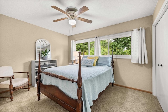 1242 E Edgewood Dr, Appleton, WI 54913 - bedroom featuring light colored carpet, a closet, and ceiling fan