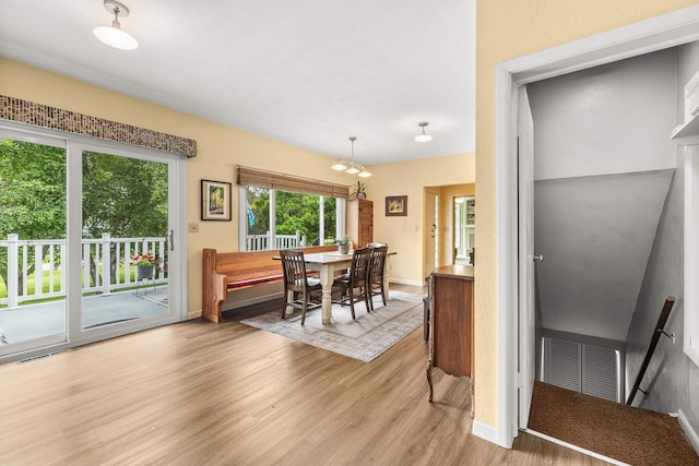 1242 E Edgewood Dr, Appleton, WI 54913 - dining space featuring light wood-style floors and baseboards
