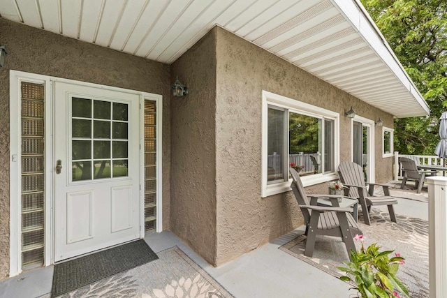 1242 E Edgewood Dr, Appleton, WI 54913 - doorway to property with stucco siding