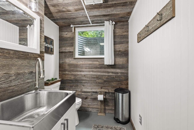 1242 E Edgewood Dr, Appleton, WI 54913 - bathroom with wooden walls, vanity, finished concrete floors, and wood ceiling
