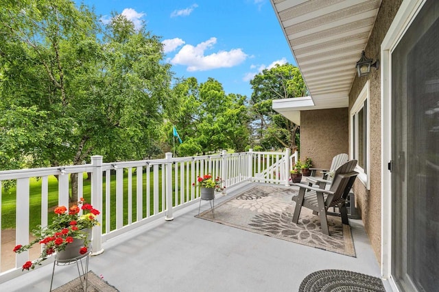 1242 E Edgewood Dr, Appleton, WI 54913 - view of patio / terrace featuring view of wooded area