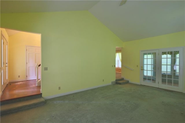 1410 Forest Knoll Ct, Eau Claire, WI 54701 - unfurnished room with high vaulted ceiling, carpet floors, and french doors