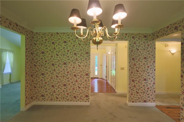 1410 Forest Knoll Ct, Eau Claire, WI 54701 - unfurnished dining area featuring ornamental molding, carpet floors, wallpapered walls, and a chandelier