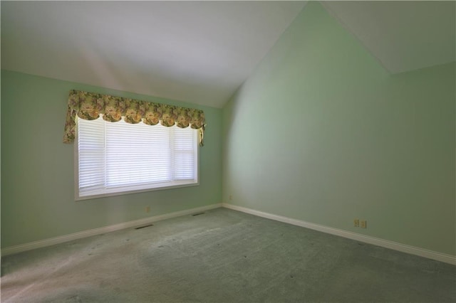 1410 Forest Knoll Ct, Eau Claire, WI 54701 - carpeted empty room with vaulted ceiling and baseboards