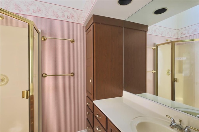 1410 Forest Knoll Ct, Eau Claire, WI 54701 - full bath featuring wallpapered walls, a shower stall, and vanity