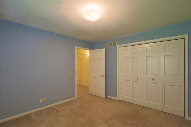 1410 Forest Knoll Ct, Eau Claire, WI 54701 - unfurnished bedroom featuring carpet floors and a closet