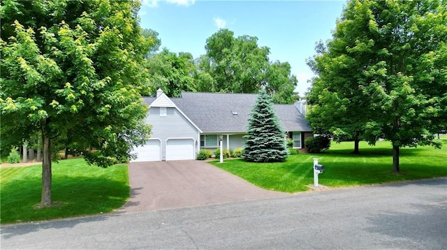1410 Forest Knoll Ct, Eau Claire, WI 54701 - view of front of property with asphalt driveway, a front lawn, and an attached garage