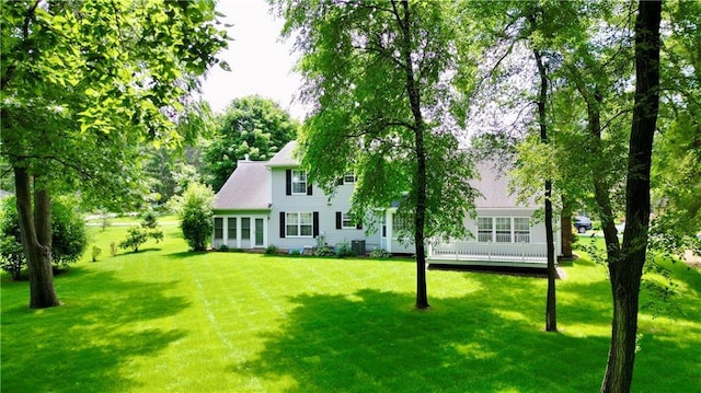 1410 Forest Knoll Ct, Eau Claire, WI 54701 - rear view of house featuring a yard