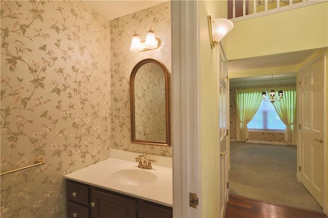 1410 Forest Knoll Ct, Eau Claire, WI 54701 - bathroom featuring vanity and wallpapered walls