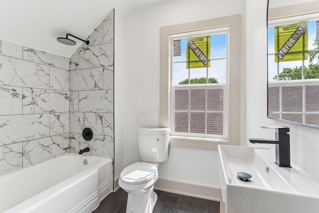 1617 69th St, Kenosha, WI 53143 - full bath with tub / shower combination, plenty of natural light, vanity, and vaulted ceiling